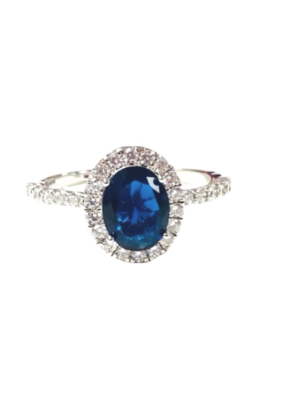 #BlueSapphireRing #HaloRing #OvalCutRing #CocktailRing #StatementJewelry #Royals